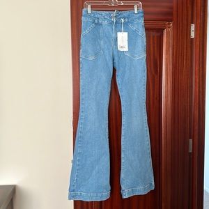 Frame women double button pocket flare. Size 28. Never worn